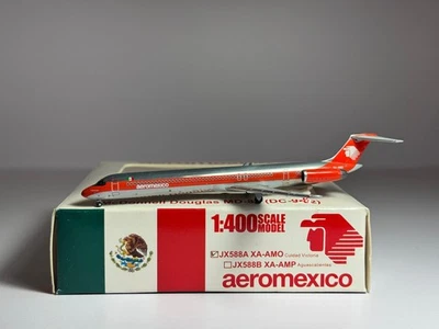 JC Wings 1:400 Aeromexico McDonnell Douglas MD-82 XA-AMO Naranja Raya Pulida Foto 1 de 2