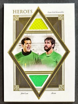 2022-23 Futera Unique Julio Cesar Alisson Becker #'d 34/35 GU Dual Jersey Brazil - Image 1 of 4