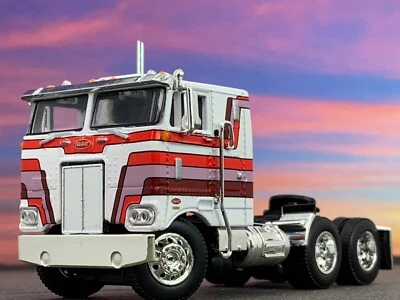 1/64 DCP WHITE/RED/PURPLE/BURGUNDY 352 PETERBILT 86" COE - Image 1 of 4