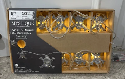 Cadena de luces Mystique calavera y hueso 10 luces LED decoración de Halloween 6 pies Foto 1 de 4