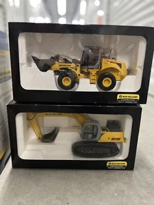 New Holland - bulldozer and the excavator. E215 -D180 - Picture 1 of 5