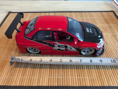 1/18 Rápido y Furioso Mitsubishi Lancer Evolution Diecast Tokyo Drift Jada Foto 1 de 4