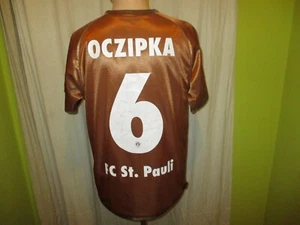 FC St.Pauli DoYou Football Jubiläum Wende Trikot 2010/11 + Nr.6 Oczipka Gr.M - Bild 1 von 9