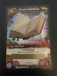 World of Warcraft WOW TCG FLOATING SPELLBOOK Unscratched Loot Card - Picture 1 of 2