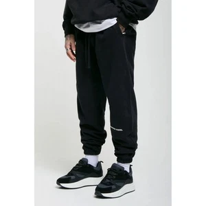 Madison Kohl Core Oversized Relaxed Fit Mould Injection Logo Cuffed Jogger Black - Picture 1 of 4