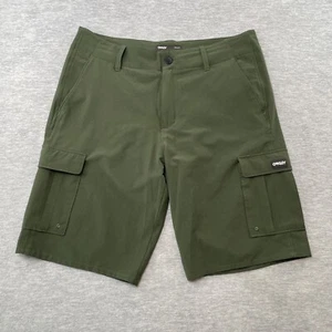 Pantalones Cortos Oakley Hombre 32 Verde B1B Carga Híbrido Cepillo Oscuro Repelente al Agua - Imagen 1 de 19