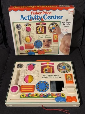 Centro de actividades Fisher Price 1984 bebé niño cuna tabla ocupada juguete de colección en caja Foto 1 de 4