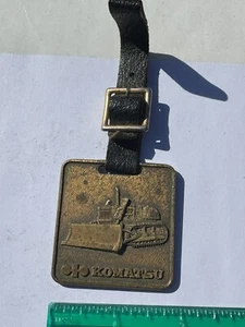 KOMATSU TRACTOR BULLDOZER POCKET WATCH FOB LELAND EQUIPMENT CO OKLAHOMA CITY OK - Picture 1 of 6