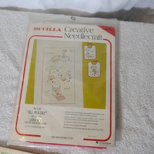 Vintage Bucilla 2 LARGE BABY BIBS Cross Stitch Kit 1763 Morning Noon Night - Picture 1 of 5