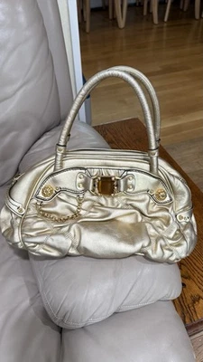 Bolso Juicy Couture Vintage Dorado Metálico y Cuero Joyado Foto 1 de 4
