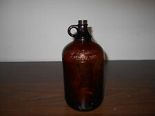 EARLY ANTIQUE AMBER ONE HALF GAL GLASS JUG WITH 2 INDENTATIONS OF FINGER MARKS