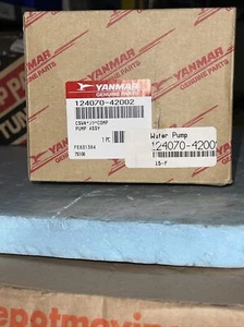 YANMAR MARINE DIESEL OEM GENUINE RAW WATER PUMP;P/N 124070-42002. - Picture 1 of 7