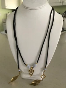Black Leather with gold tone beads, 2 leaves clinging at the end of leather - Picture 1 of 3