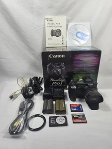 Canon PowerShot Pro 1 8,0 megapixel fotocamera digitale - nero - caricabatterie - 2 batterie, 2 CF - Foto 1 di 13