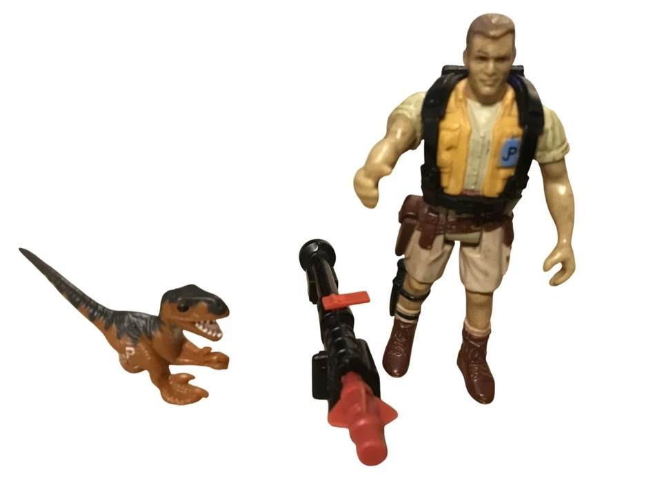 1993 Jurassic Park Robert Muldoon w/ Hatchling Dino & Weapon - Image 1 of 4