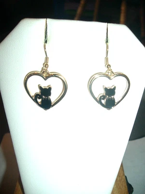 Dangling BLACK CAT SITTING INSIDE GOLD HEART Gold Betsey Johnson Pierced Earring - Image 1 of 4