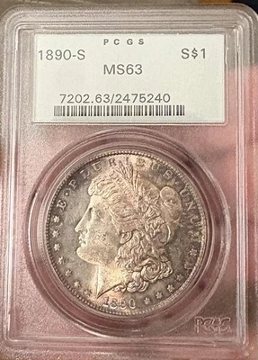 1890 S NGC MS63 MORGAN DOLLAR WITH NKCE COLOR IN OGH - Image 1 of 2