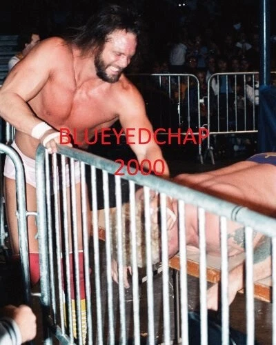 RANDY SAVAGE VS HARLEY RACE WRESTLER 8 X 10 WRESTLING PHOTO  NWA WWF - Image 1 of 1