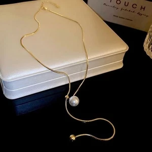 Vintage long pearl necklace with tassel ideal for a chic and stylish - Picture 1 of 14
