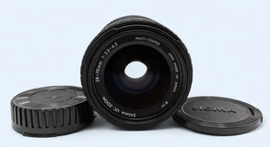 Sigma UC Zoom 28-70mm 1:3.5-4.5 Multi-Coated Camera Lens for Canon FD Mount - Picture 1 of 4