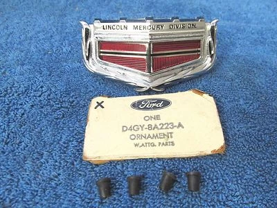1974-76 MERCURY MONTEGO  HEADER PANEL EMBLEM ORNAMENT  NOS FORD 117 - Image 1 of 4