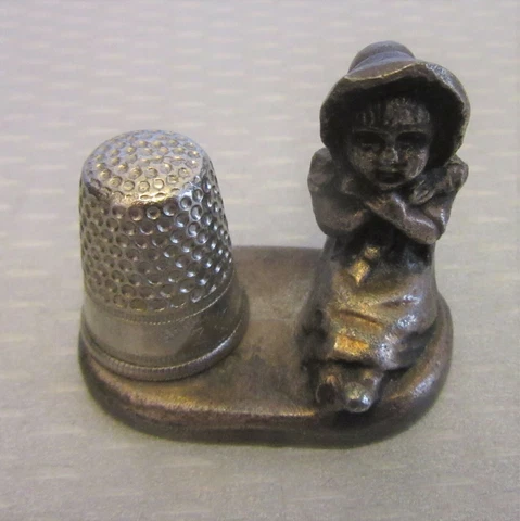 Victorian antique KATE GREENAWAY GIRL THIMBLE HOLDER STAND cast iron display Cover