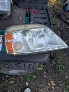 2004-2007 FORD FREESTAR PASSENGER RIGHT, HALOGEN HEADLIGHT  - Picture 1 of 7