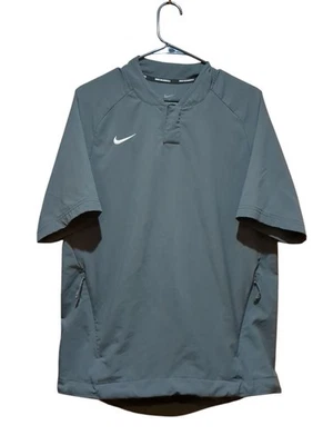 Pullover de béisbol Nike Performance gris manga corta con bolsillos para las manos. Hombre Med Foto 1 de 4