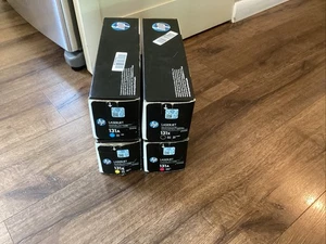 4 HP LaserJet 131A 131X Oryginalny toner Partia Czarny Purpurowy Żółty Cyjan - Zdjęcie 1 z 5