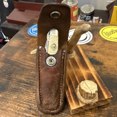 Cuchillo Camillus USA CUB SCOUT BSA Boy Scouts of America y funda de cuero  Foto 1 de 4