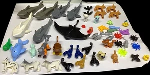 Lote enorme de 50 Lego animales terrestres y acuáticos raya tiburones perros gatos pájaros peces - Imagen 1 de 6