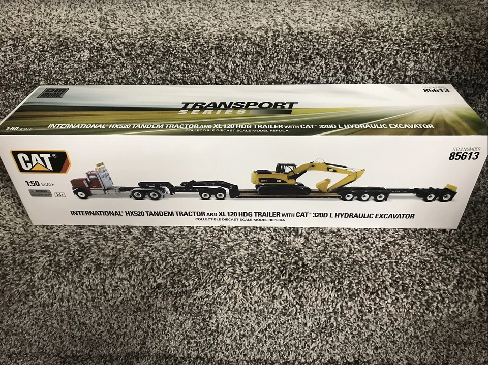 1:50 Diecast Masters International HX520 Semi w/Lowboy CAT 320DL Excavator NEW!! - Image 1 of 4