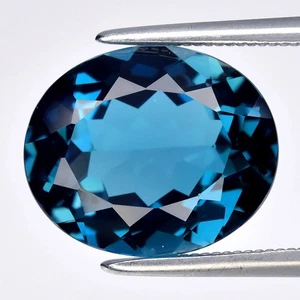 💎 5.20ct 12x10mm VS Oval Natural London Blue Topaz - Stunning Brazil Gemstone - Picture 1 of 4