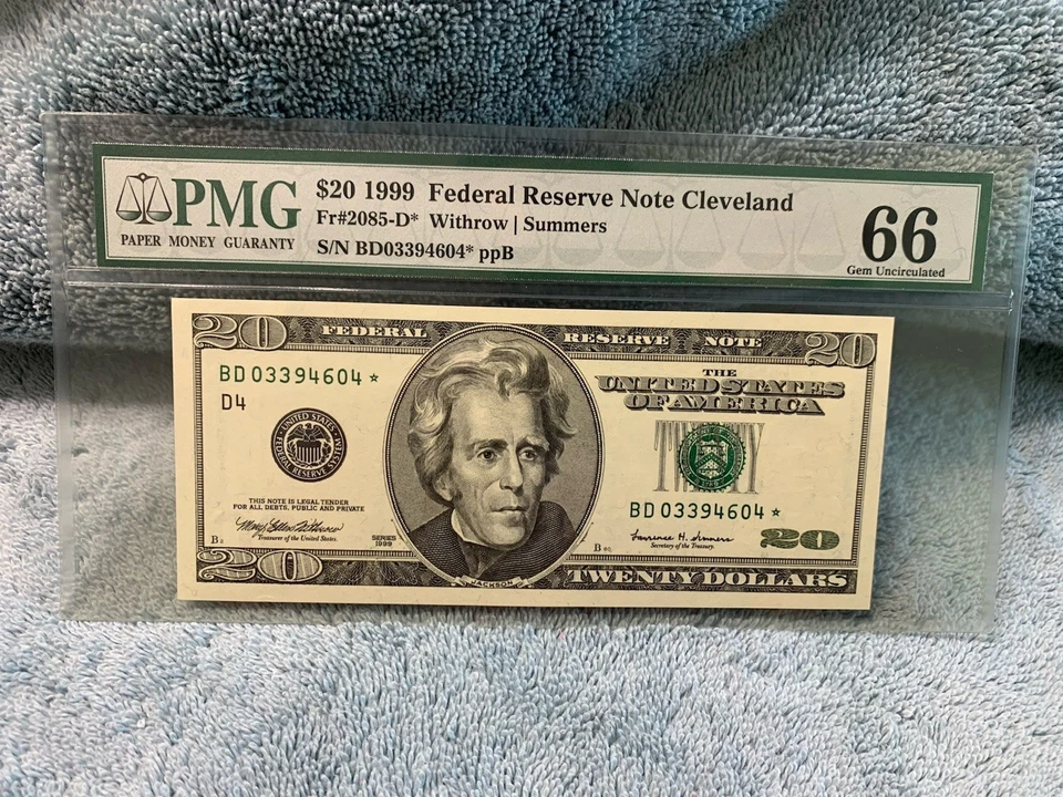 1999 $20 Federal Reserve Note Fr 2085-D Star PMG 66 - Image 1 of 2