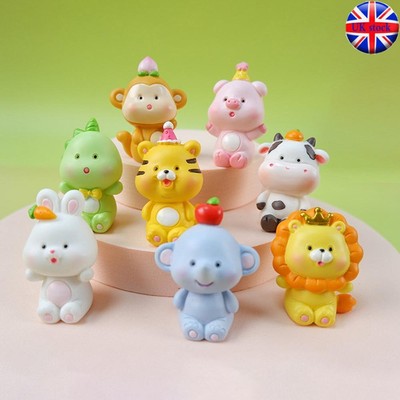 Premium Photo | There Is A Tiger Cub Sitting In The Grass With Flowers - Foto 12