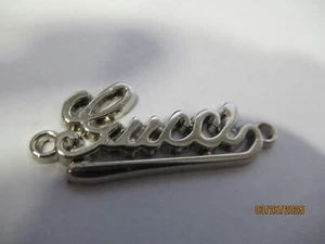 GUCCI ZIP PULL 32x14MM LIMPIO tono plata, ESTO ES PARA 1 - Imagen 1 de 3