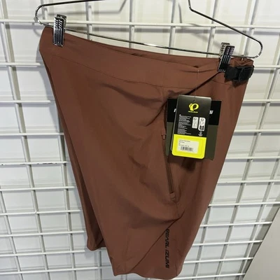 Pantalón Corto PEARL iZUMi Summit Shell - Para Hombre Talla 32 Cerveza de Raíz Mediana $115 Foto 1 de 3