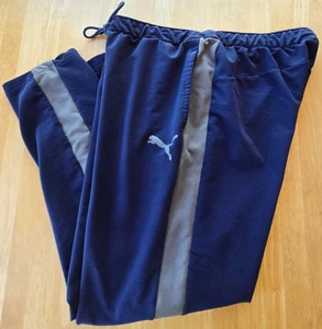 Puma Jogginghose Herren L blau mit silbernen Reflexstreifen Kordelzug Taschen - Bild 1 von 4