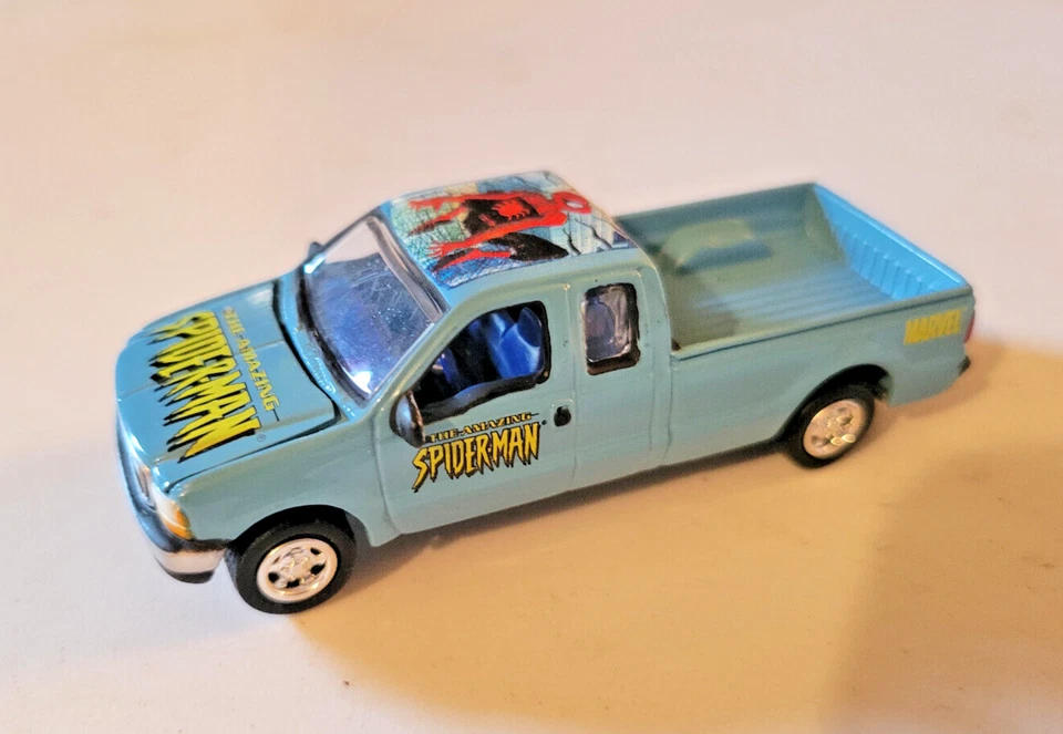 Johnny Lightning 1999-2004 Ford F-Series picape azul SPIDERMAN F250 1/64 - Imagem 1 de 4