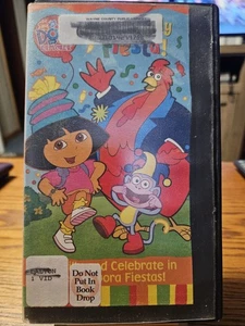 DORA THE EXPLORER-SUPER SILLY FIESTA.DOES HAVE STICKERS FROM A LIBARY SALE. - Picture 1 of 9