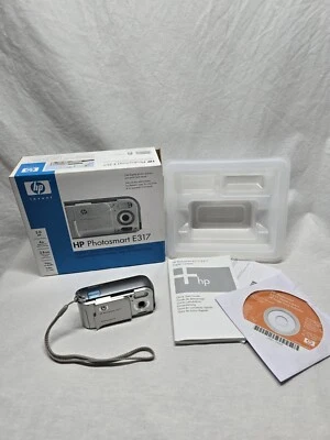 HP Photosmart E317 5.0MP Compact Digital Camera - Silver - Tested Working - Image 1 of 4