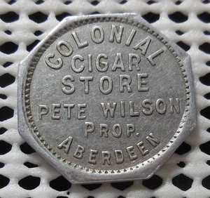 ABERDEEN WASHINGTON COLONIAL CIGAR STORE PETE WILSON GOOD FOR 15¢ IN TRADE TOKEN - Picture 1 of 2