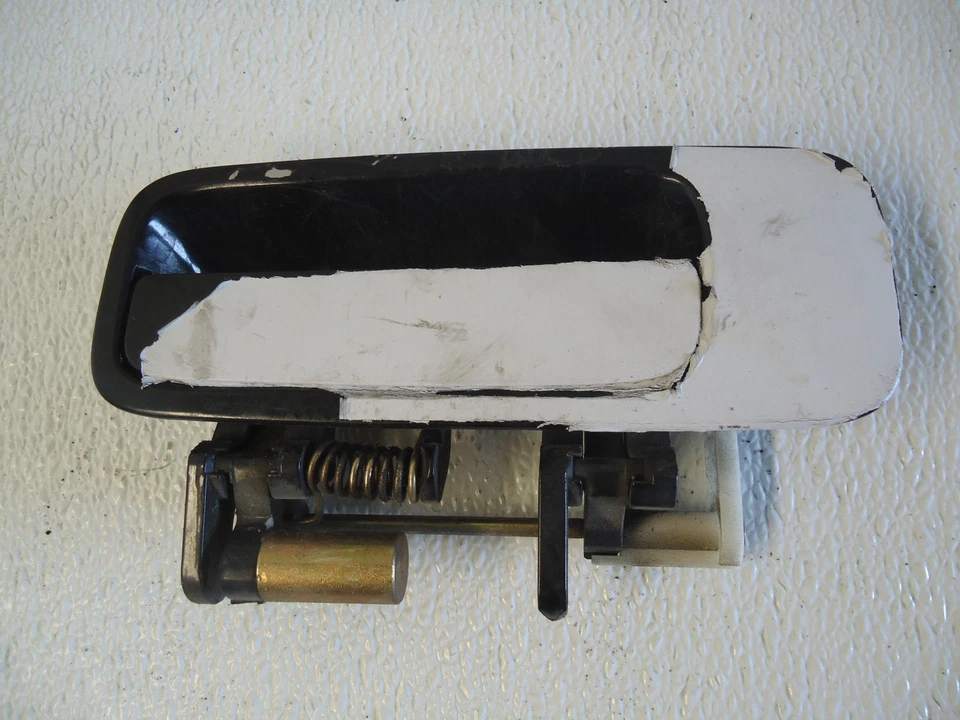 Manija de puerta trasera derecha exterior Toyota Camry 2000 69230-AA010 Foto 1 de 3