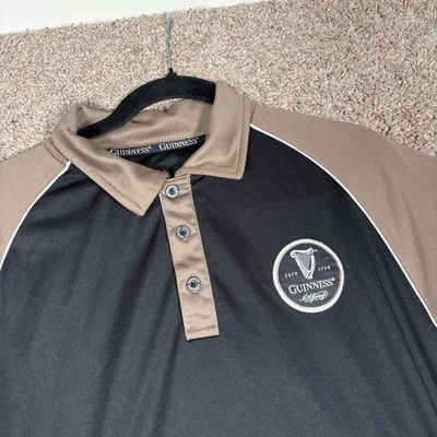Camisa polo de golf Guinness para hombre L negra tostada blanca manga corta logotipo abotonado Foto 1 de 4