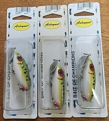 Lote de 3. Señuelos Fred Arbogast Jitterbug G600-FW Topwater.  Rana herida Foto 1 de 4