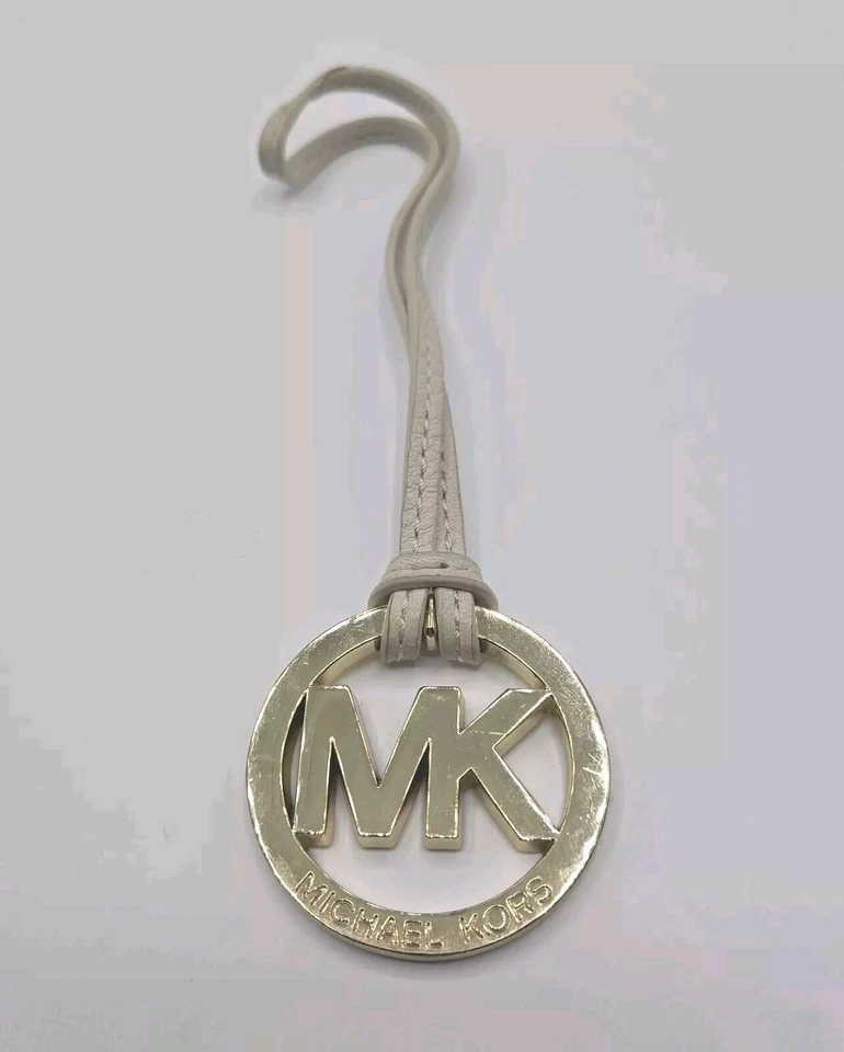 Michael Kors Cartera Dije Llavero Llavero Logo 2" Diámetro Tono Dorado Foto 1 de 4