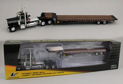 DCP 1:64 *BLACK* Peterbilt 389 Day Cab Semi w/LANDOLL 440 Traveling Axle Trailer - Image 1 of 4