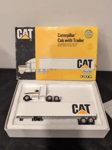 1/64  Ertl  cat Caterpillar Cab With Trailer #7712 With Box - Picture 1 of 2