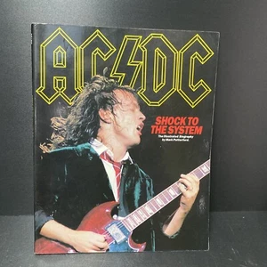 AC/DC Shock To The System paperback book 1992 Putterford Illustrated Biography - Picture 1 of 3