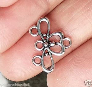 12 pz di collegamento connettore argento antico con 4 anelli 19x13mm - Foto 1 di 2